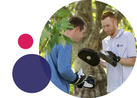 Man boxing with a physiologist